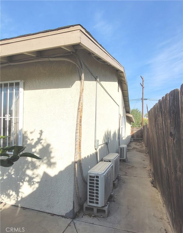 view of property exterior featuring ac unit