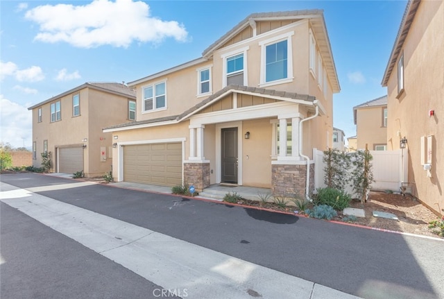 view of front of home with a garage