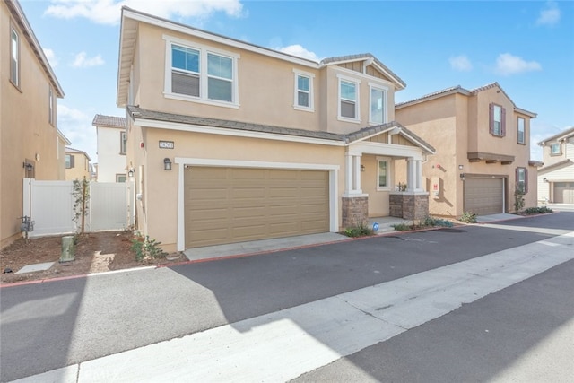 view of front of home with a garage