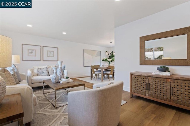 living room with light hardwood / wood-style flooring