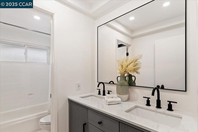 full bathroom with vanity, shower / washtub combination, and toilet