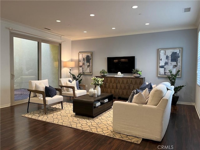 living room with ornamental molding and hardwood / wood-style floors