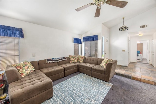 living room with vaulted ceiling, carpet floors, and ceiling fan