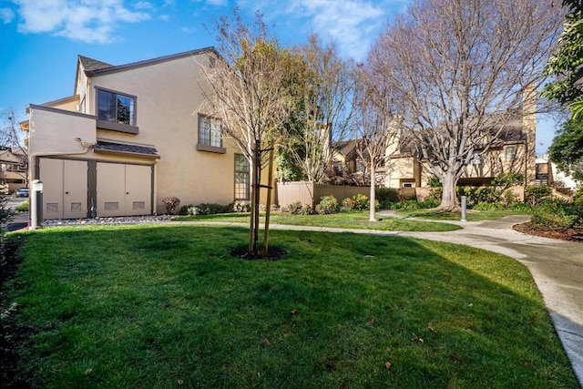 view of yard featuring a garage