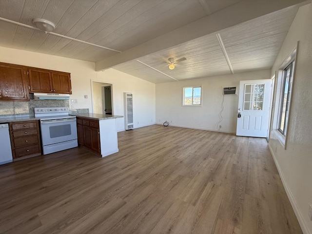 kitchen featuring vaulted ceiling with beams, wood ceiling, light wood-type flooring, kitchen peninsula, and white appliances