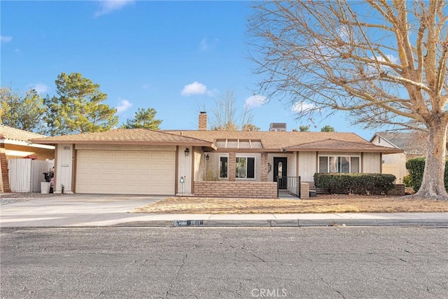 single story home with a garage