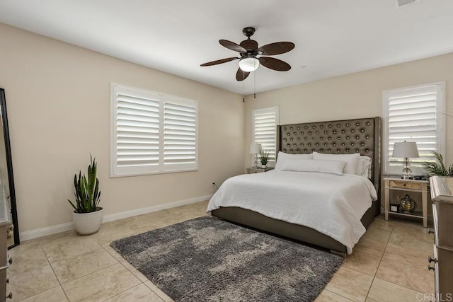 bedroom featuring ceiling fan and light tile patterned floors