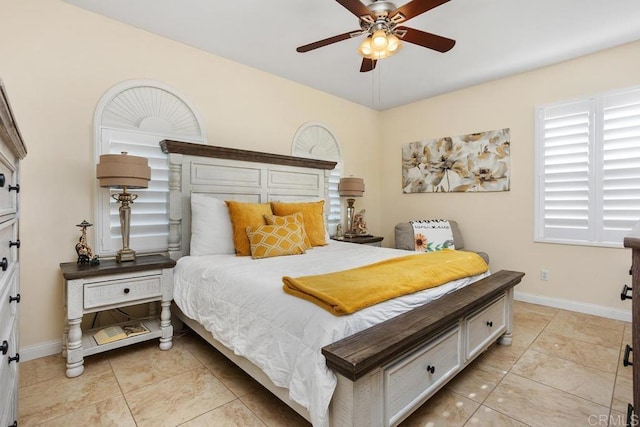 bedroom featuring light tile patterned floors and ceiling fan