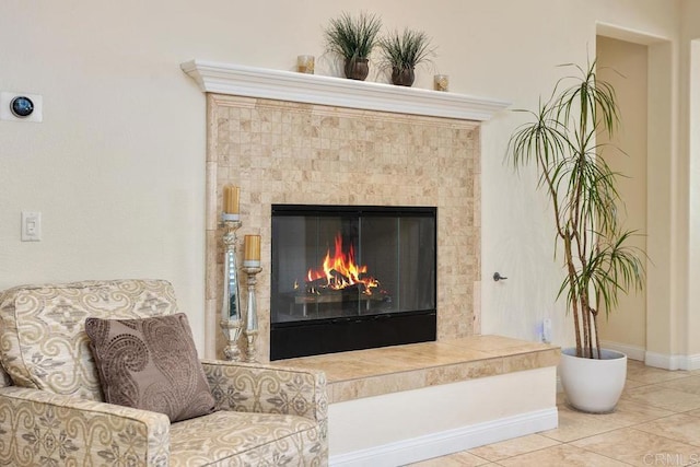 room details featuring a tile fireplace