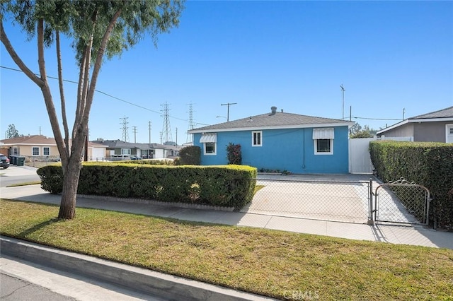 ranch-style home with a front yard