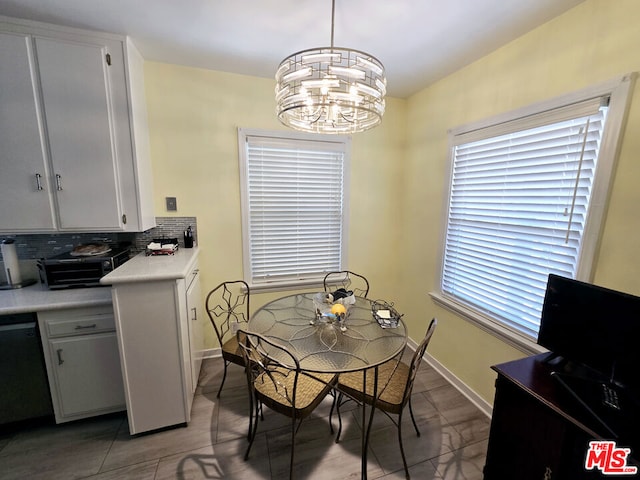 dining room with a chandelier