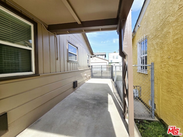 view of side of property featuring a patio