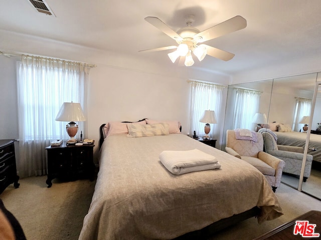 bedroom with carpet floors and ceiling fan