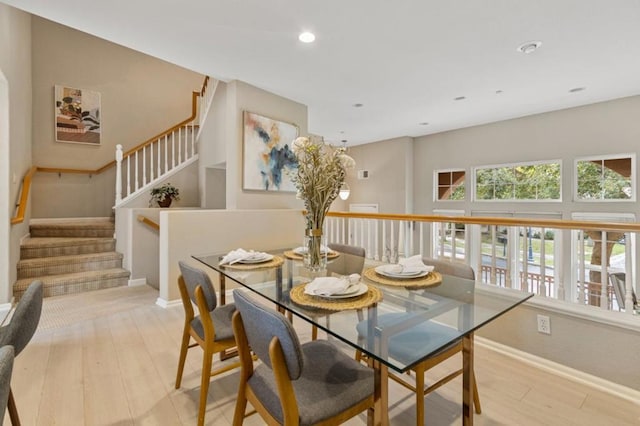 dining space featuring light hardwood / wood-style flooring