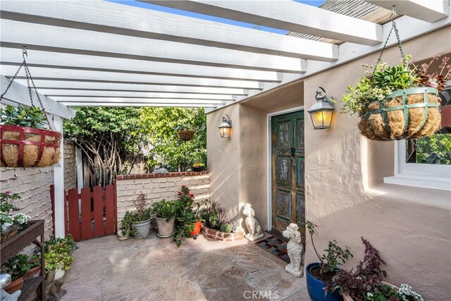 view of patio featuring a pergola