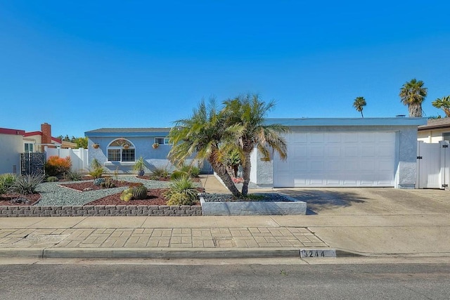 single story home with a garage