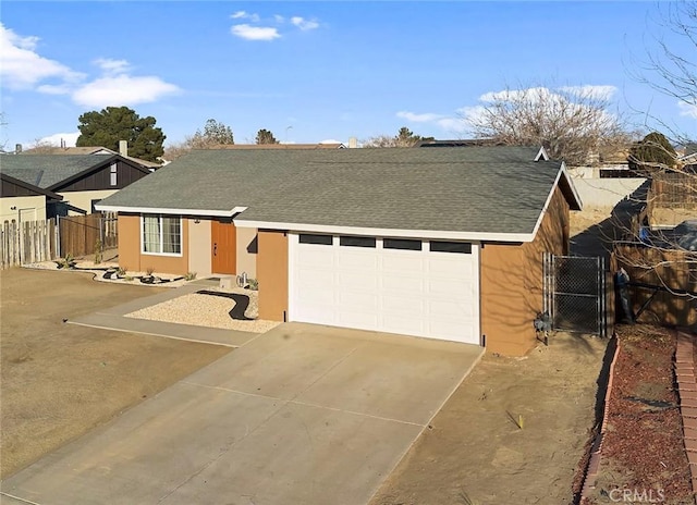 ranch-style home featuring a garage