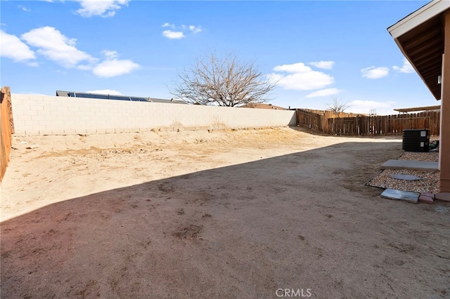 view of yard with central AC