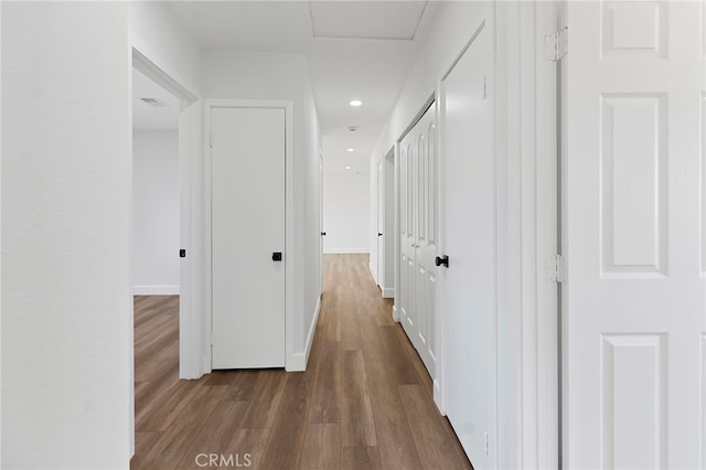 hall featuring dark hardwood / wood-style floors