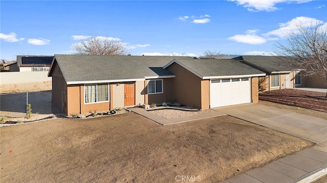 ranch-style house featuring a garage