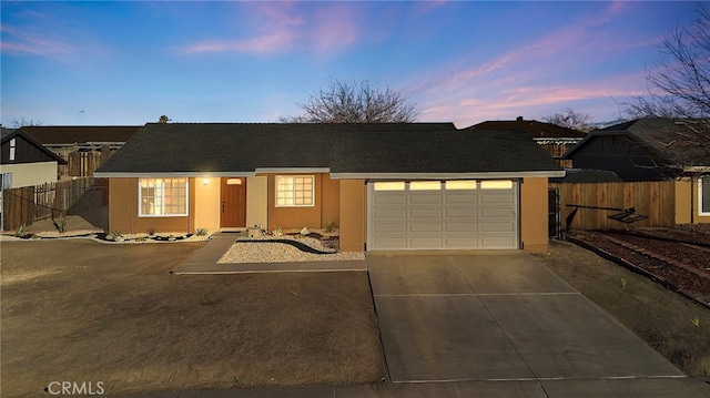 ranch-style house with a garage