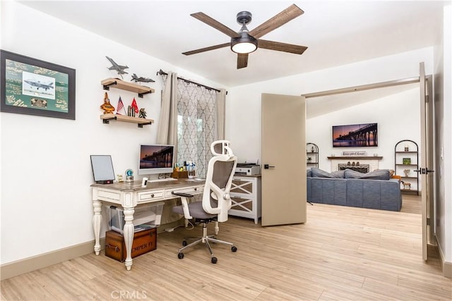 office space with ceiling fan and light hardwood / wood-style floors