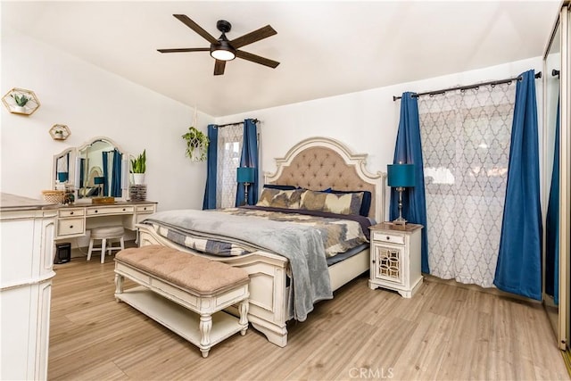 bedroom featuring ceiling fan and light wood-type flooring