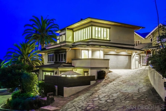 view of front of property featuring a garage