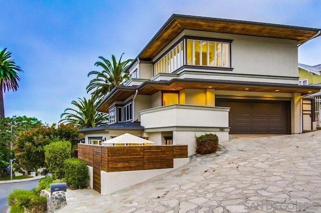 view of front of property featuring a garage