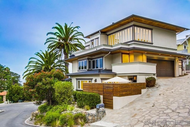 view of front of property with a garage