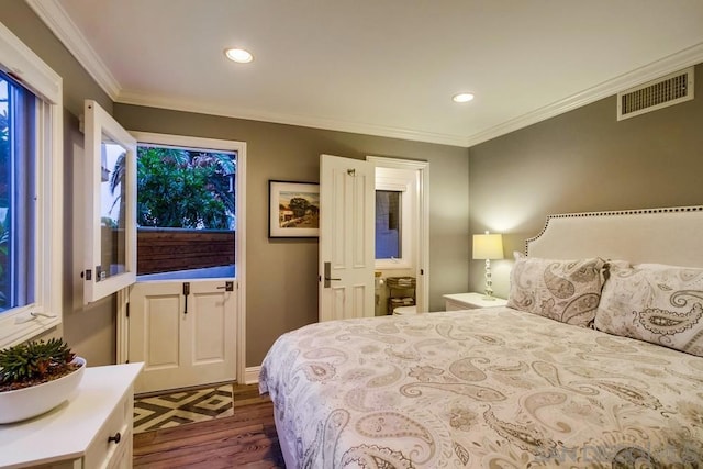 bedroom featuring ornamental molding and dark wood-type flooring