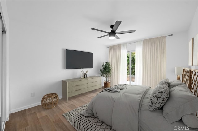 bedroom featuring ceiling fan and light wood-type flooring