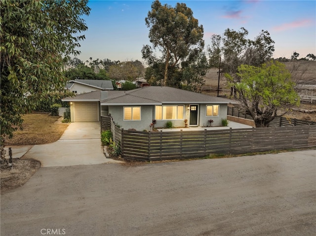 view of front of property featuring a garage