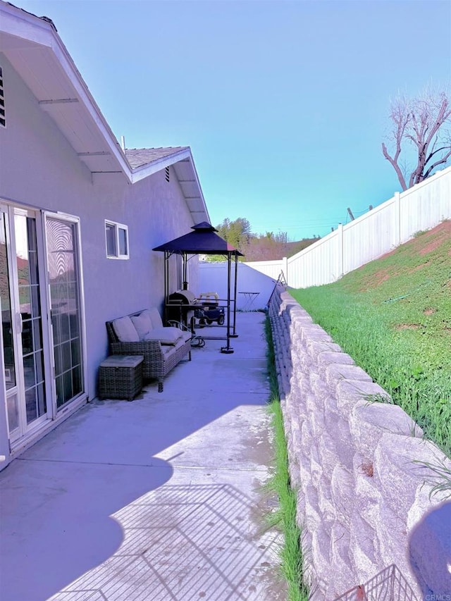 view of patio with a fenced backyard