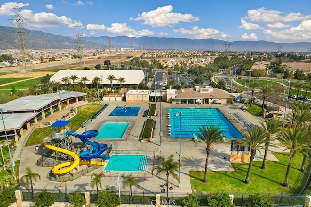 view of swimming pool featuring a mountain view