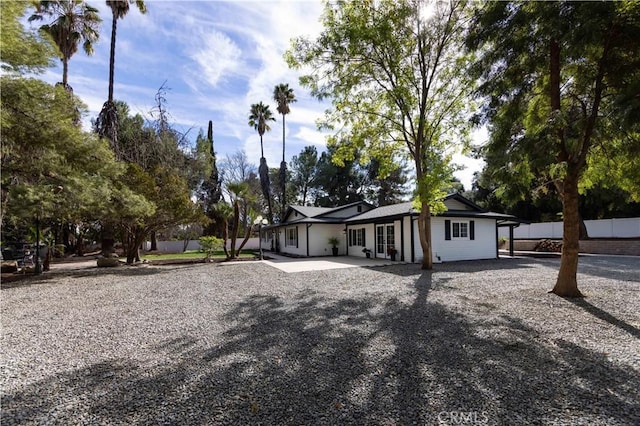 view of front of property featuring a patio