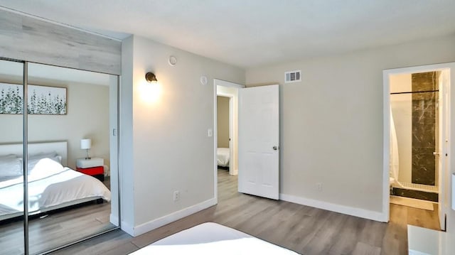 bedroom featuring light hardwood / wood-style flooring