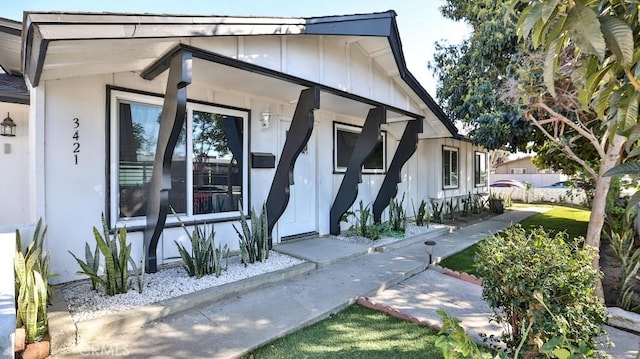 property entrance with board and batten siding