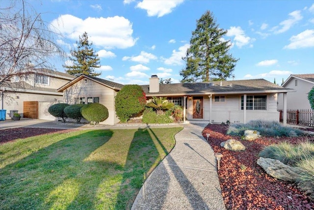 view of front of home with a front lawn