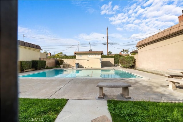 view of pool with a patio