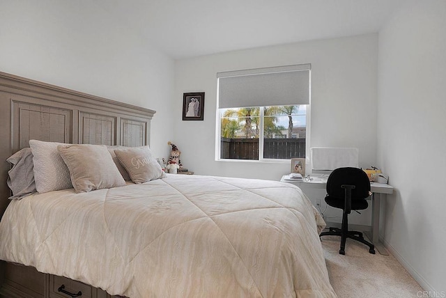 bedroom with light carpet