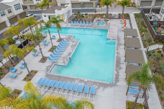 view of swimming pool with a patio