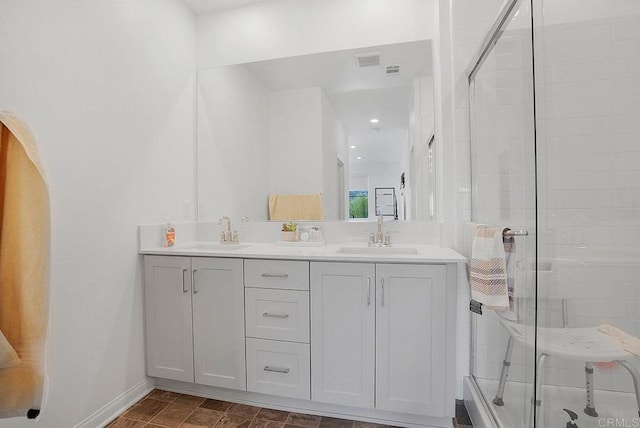 bathroom featuring vanity and walk in shower