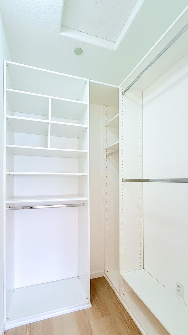 walk in closet featuring light wood-type flooring