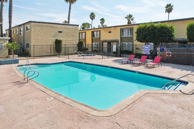 view of pool with a patio