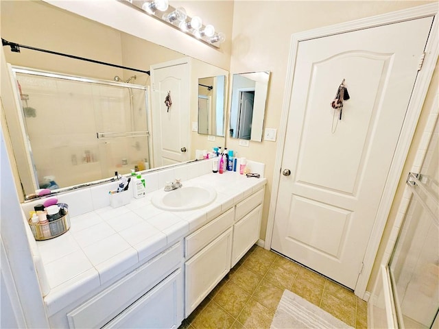 bathroom featuring vanity and tile patterned floors