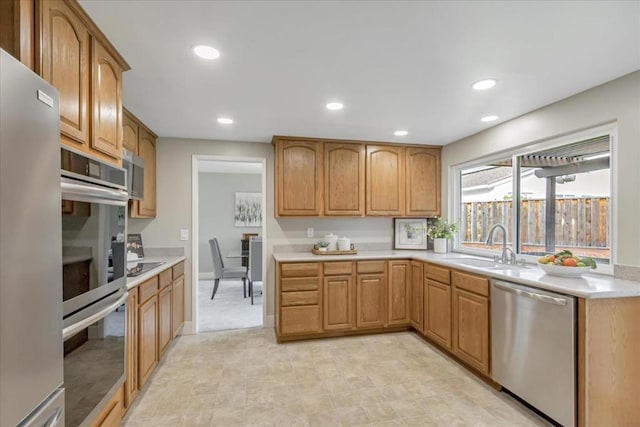 kitchen featuring stainless steel appliances and sink