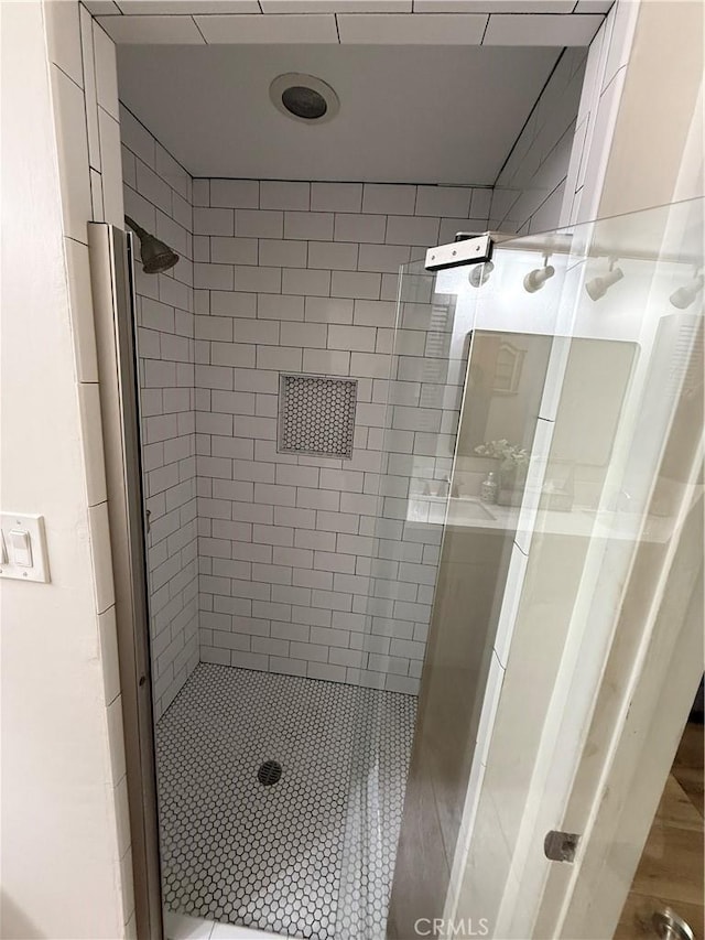 bathroom featuring a stall shower
