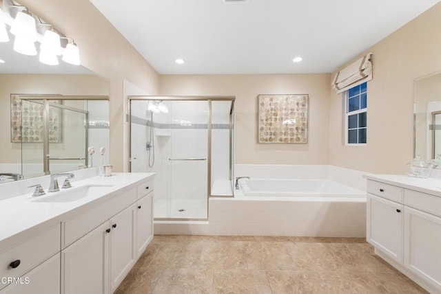 bathroom featuring vanity and plus walk in shower