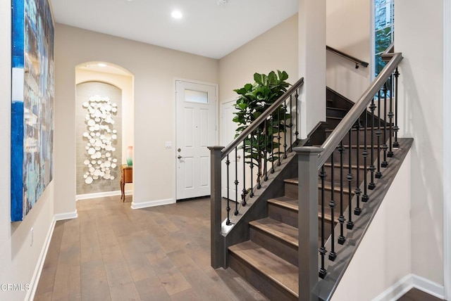 foyer with wood-type flooring